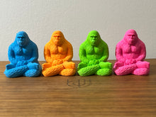 Load image into Gallery viewer, Day-Glo Bigfoot Yogi Erasers.
